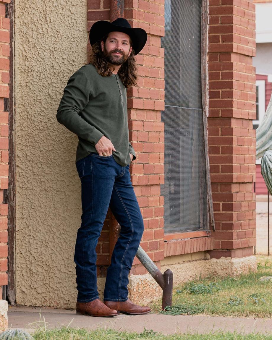 Man wearing the Wade Russet Brown Cowboy Boots