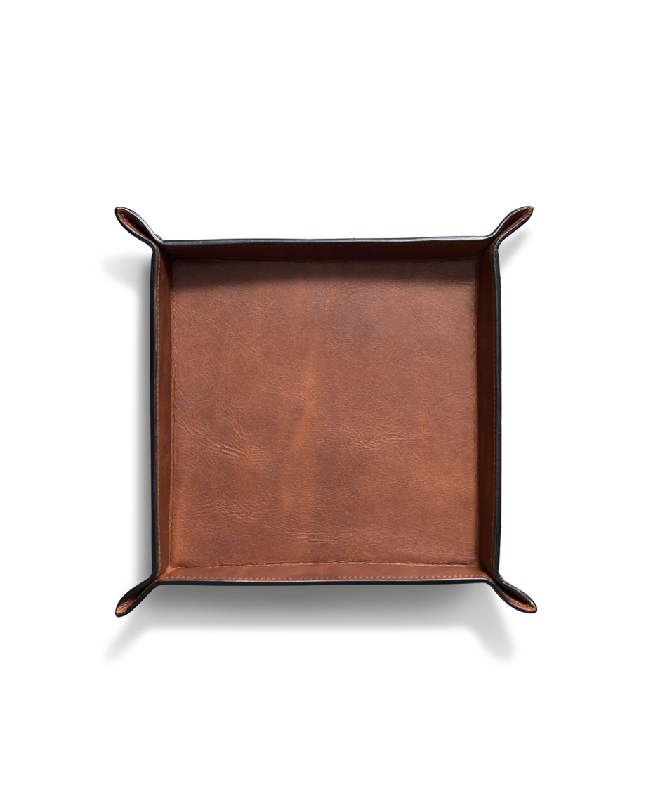 A square brown leather valet tray with raised edges and rounded corners, photographed from above on a white background.