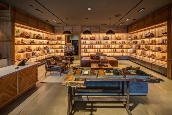 Image of the inside of the Keirland Commons Store showing wall of boots