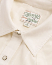 Closeup detail view of Men's Vintage Weight Short Sleeve Pearl Snap - Light Sand/Multi