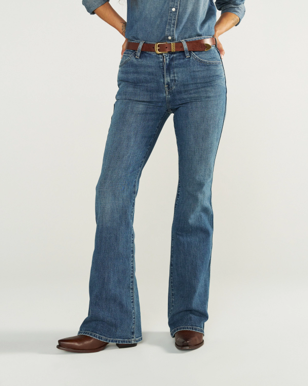 Front view of Women's Mid-Rise Slim Flare - Medium Wash on model