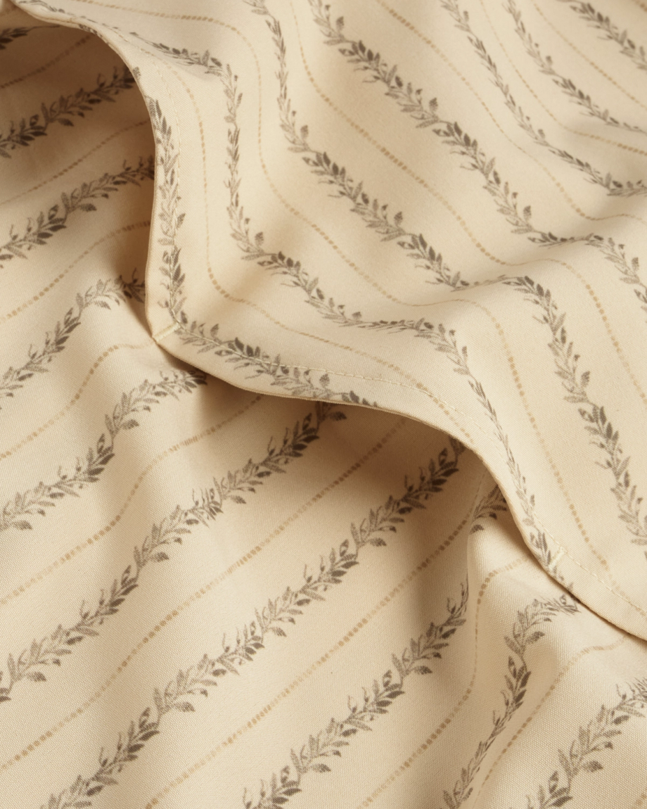 Closeup detail view of Men's Performance Western Short Sleeve Pearl Snap - Sandstone/Multi