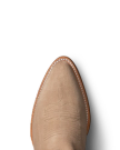 Close-up of a tan suede cowboy boot on a black background, featuring detailed stitching on the upper part and white trim along the edge.