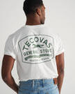 Back view of Men's General Store T-Shirt - Bone/Green on model