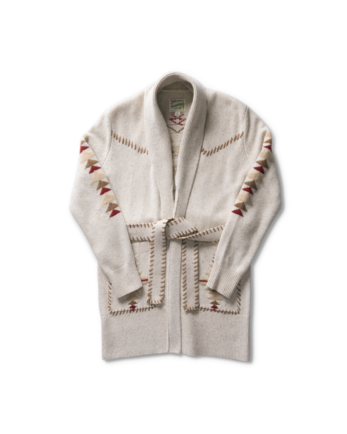 A beige knitted cardigan with a belt, geometric patterns, and two front pockets displayed against a black background.