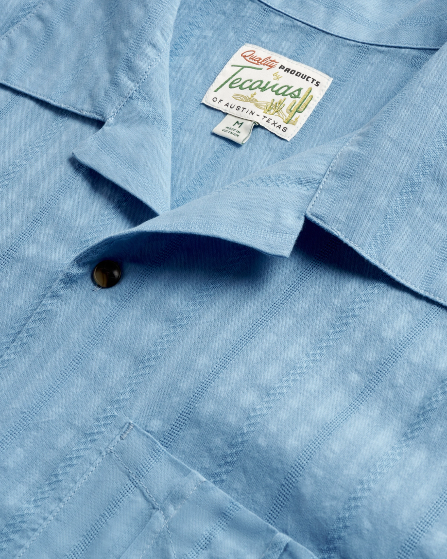 Closeup detail view of Men's Dobby Camp Short Sleeve Shirt - Light Blue