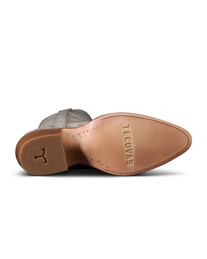 Sole view of The Abby Cavalier - Charcoal Suede on plain background