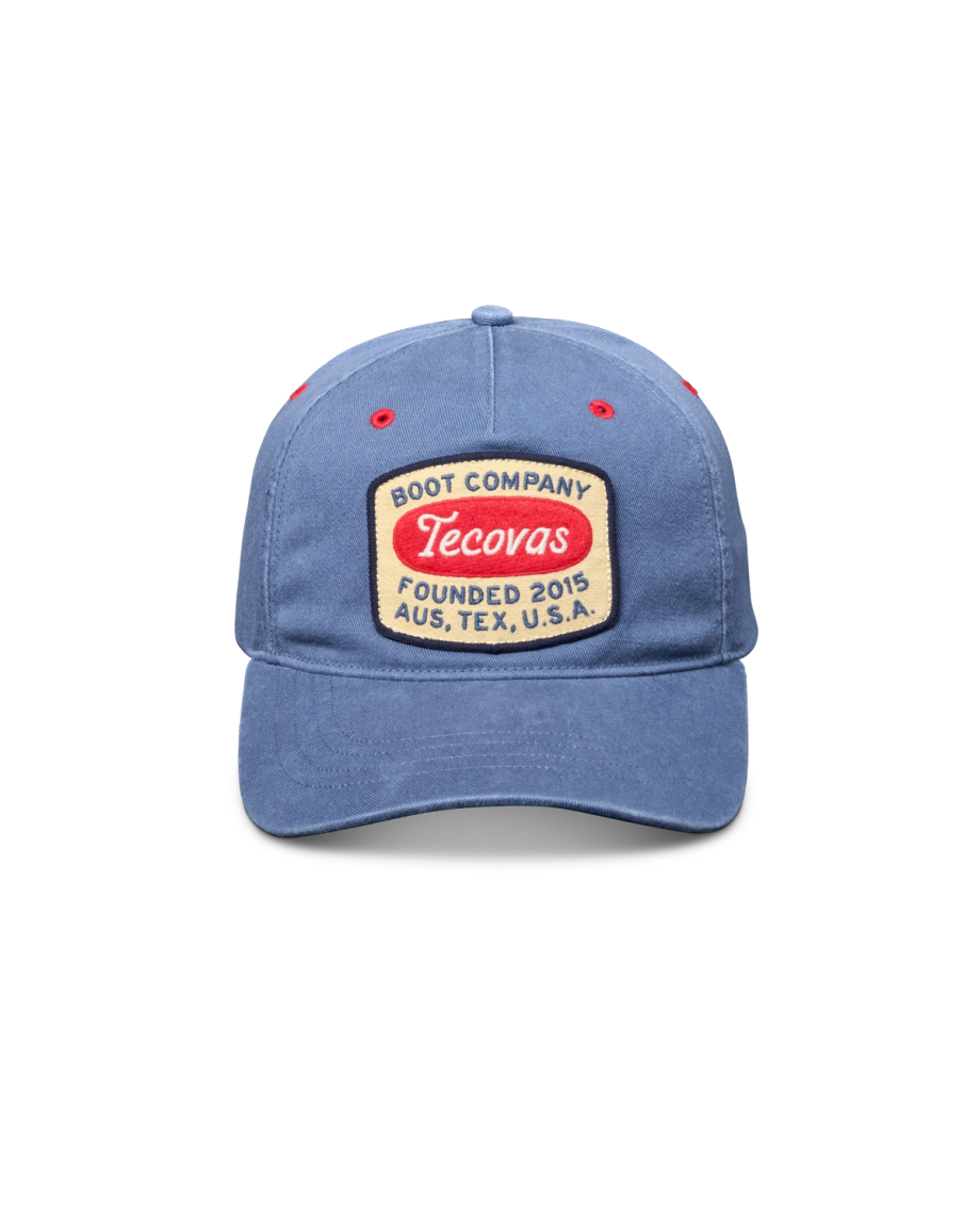 Profile view of Boot Company Hat - Blue on plain background