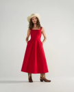 Front view of Women's Sleeveless A-Line Maxi Dress - Red on model