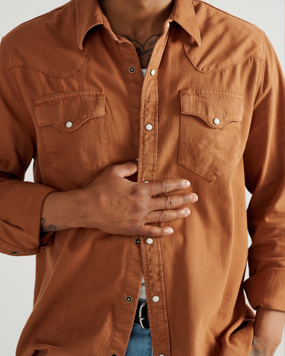 Closeup detail view of Men's Denim Long Sleeve Pearl Snap - Rust
