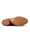 The Buck in Copper Cowhide. The image shows the sole of a brown dress shoe crafted from The Buck Cowhide, featuring textured rubber tread and a stitched heel cap.