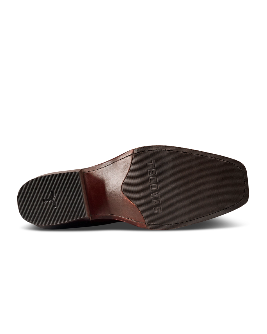 Bottom view of The Charlie Cowhide men’s dress shoe with a square toe, textured sole, and the word “STACY ADAMS” embossed near the arch, expertly crafted from luxurious scarlet cowhide.