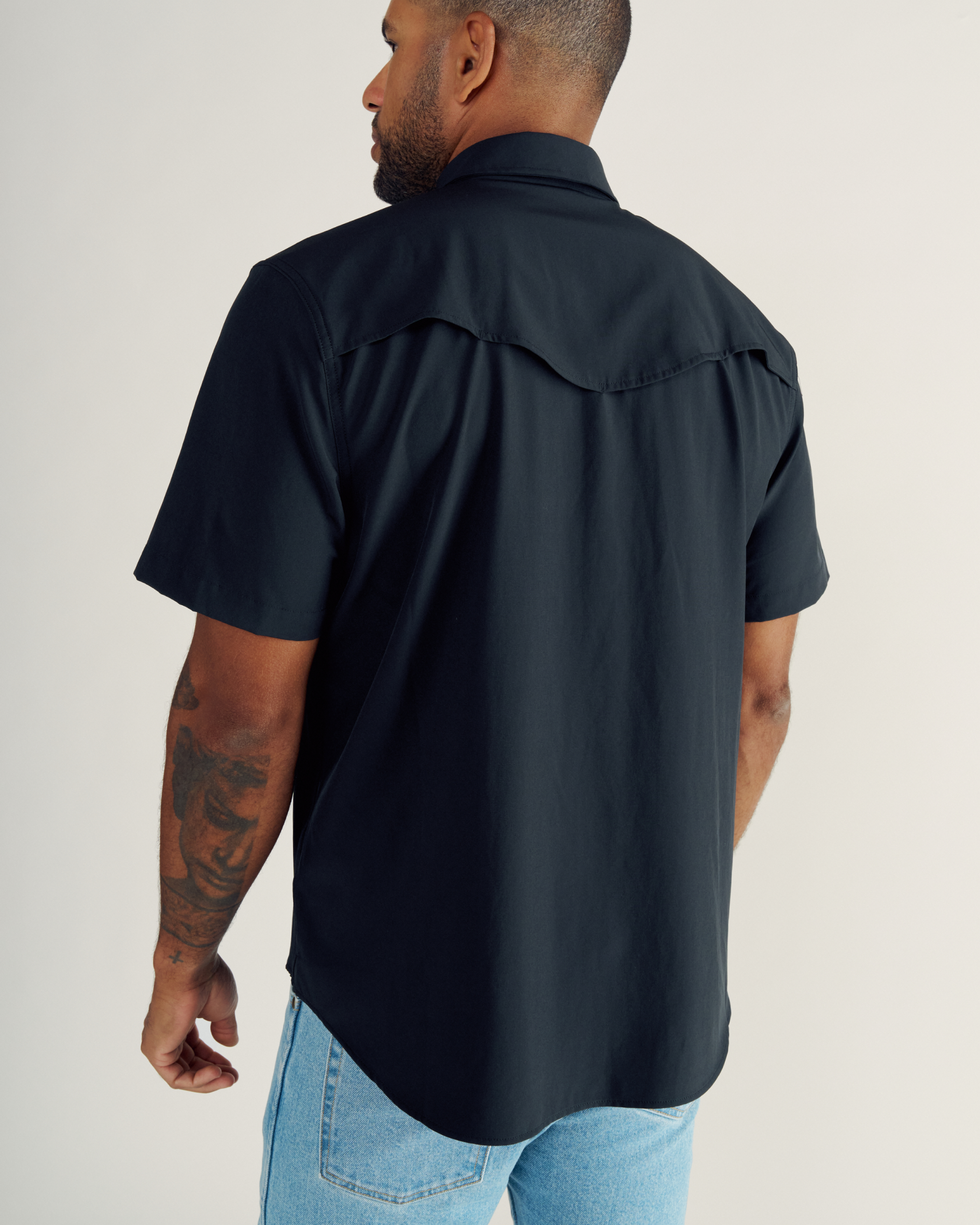 Closeup detail view of Men's Performance Western Pearl Snap SS - Black