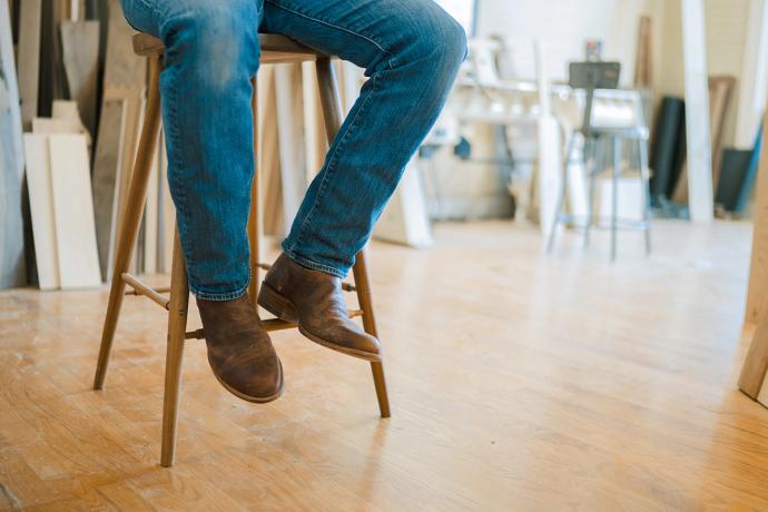 man on a stool