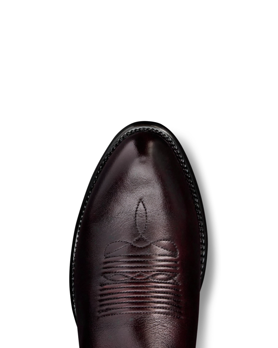 Toe view of The Cartwright - Black Cherry Cowhide on plain background