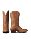 The Britt in Latte Goat. A pair of brown leather cowboy boots from Latte Goat, featuring decorative stitching and angled heels, shown from the side and back.