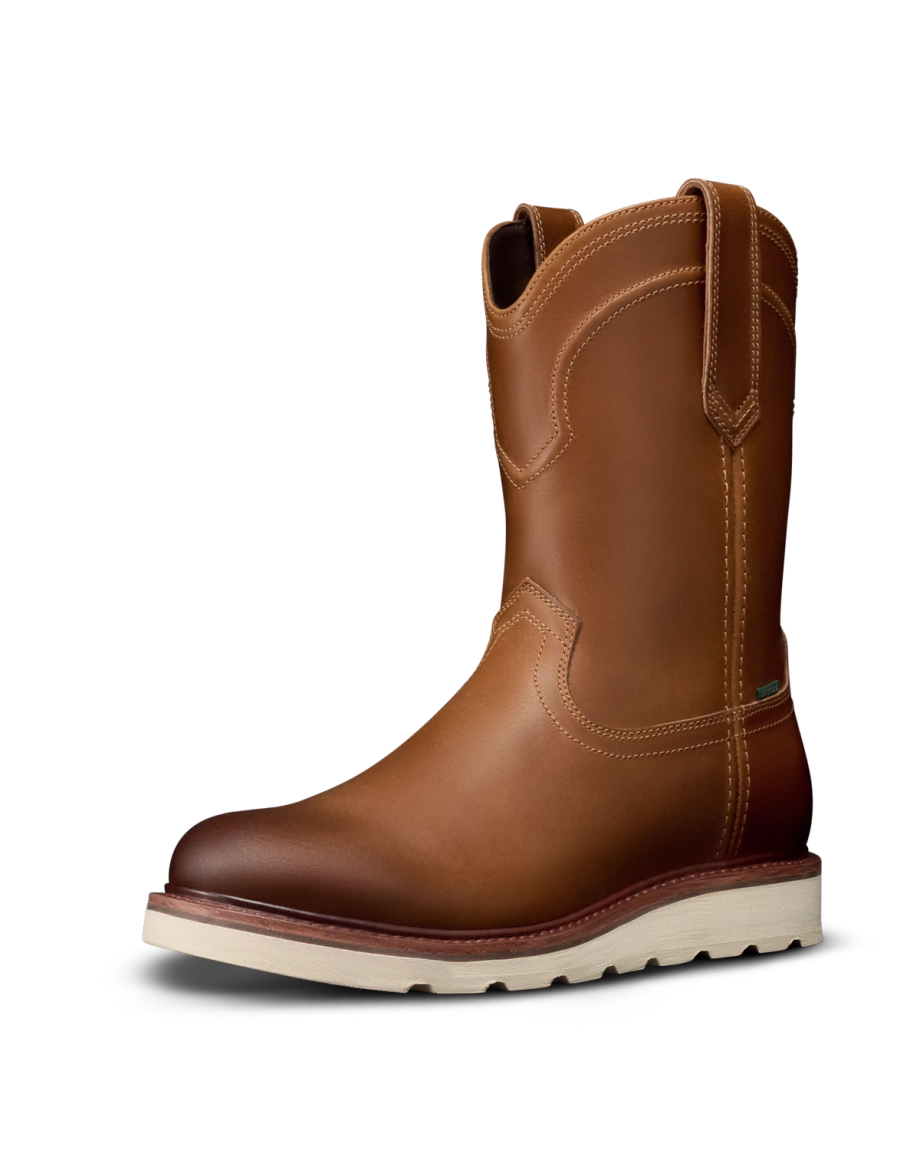 The Knox Cowhide brown leather pull-on work boot features a wheat-toned white sole, round toe, and side pull loops, displayed against a plain white background.