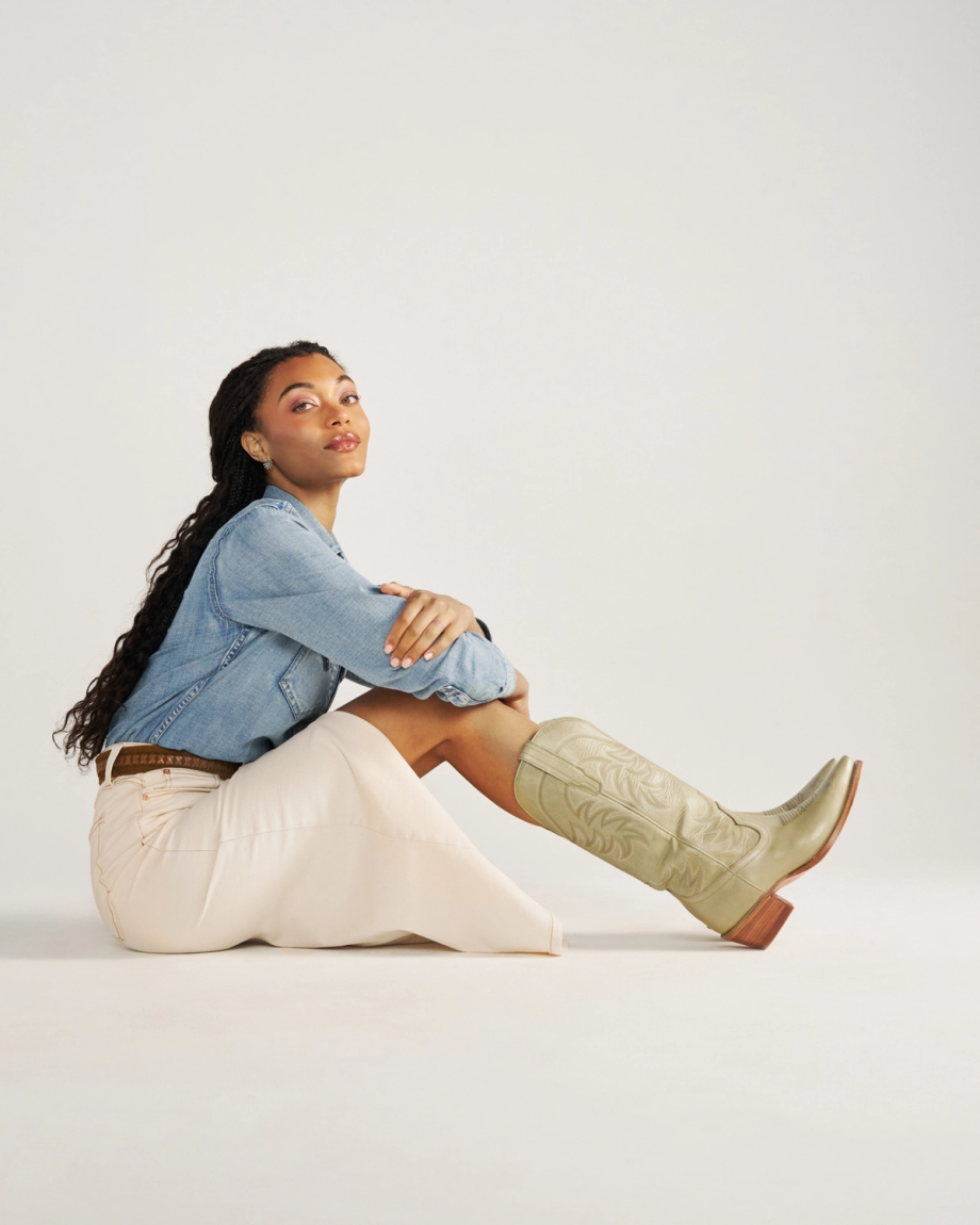 Full view of The Annie - Light Sage Cowhide on model