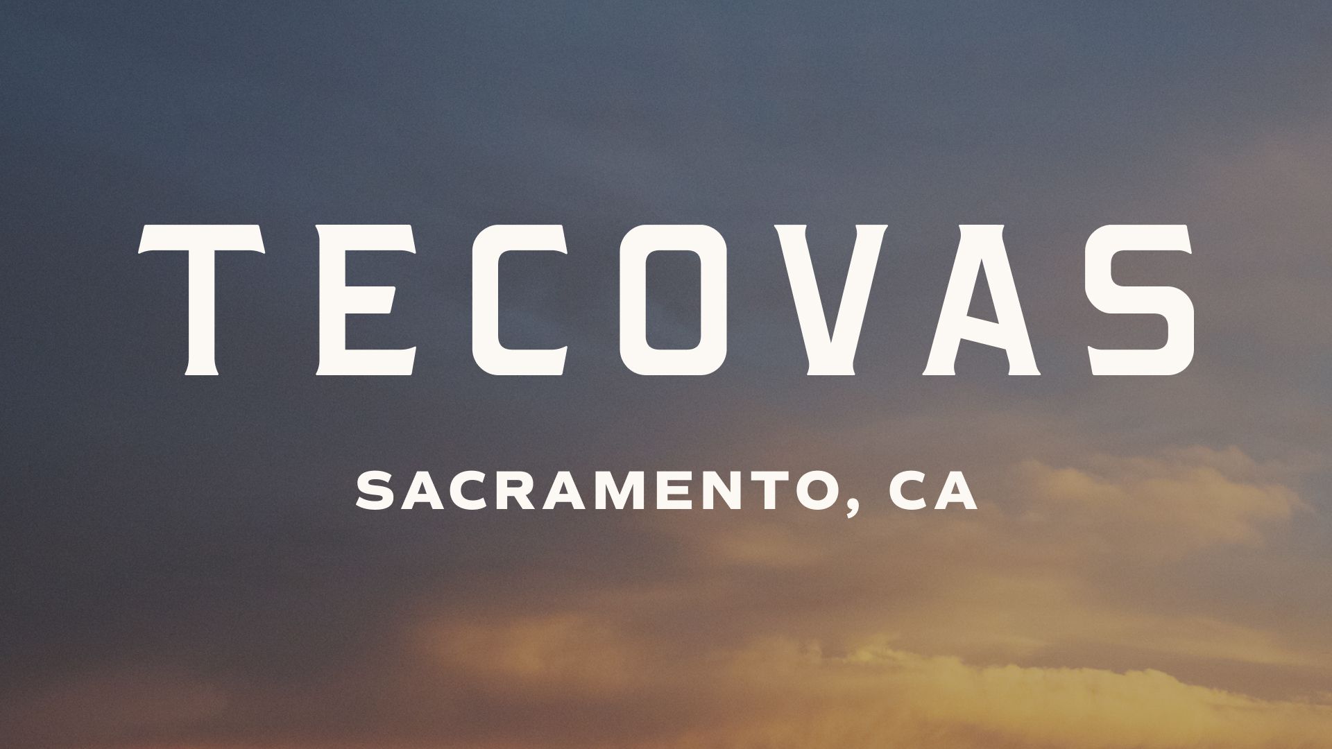 The image displays the word "Tecovas" in large white letters with "Sacramento, CA" underneath against a dusk sky background.
