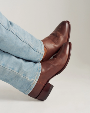 View of The Cartwright Wild Horses - Chestnut Cowhide