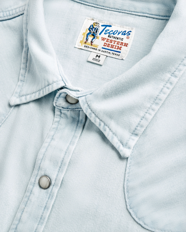 Closeup detail view of Men's Denim Long Sleeve Pearl Snap - Ultra Light