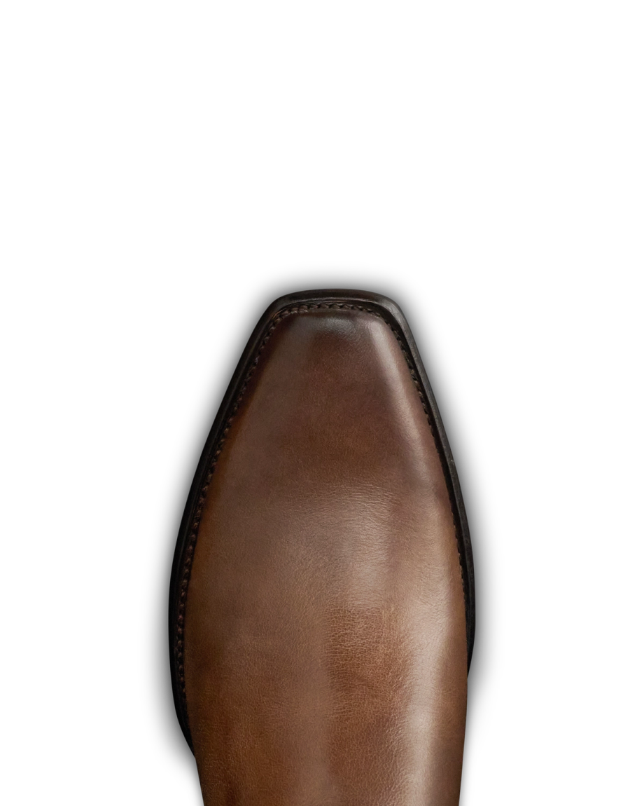 Toe view of The Warren - Vintage Tan Cowhide on plain background