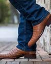 close up picture of Cole Pecan brown cowboy boots on a man's feet