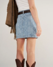 Back view of Women's High-Rise Denim Mini Skirt - Blue Bandana on model
