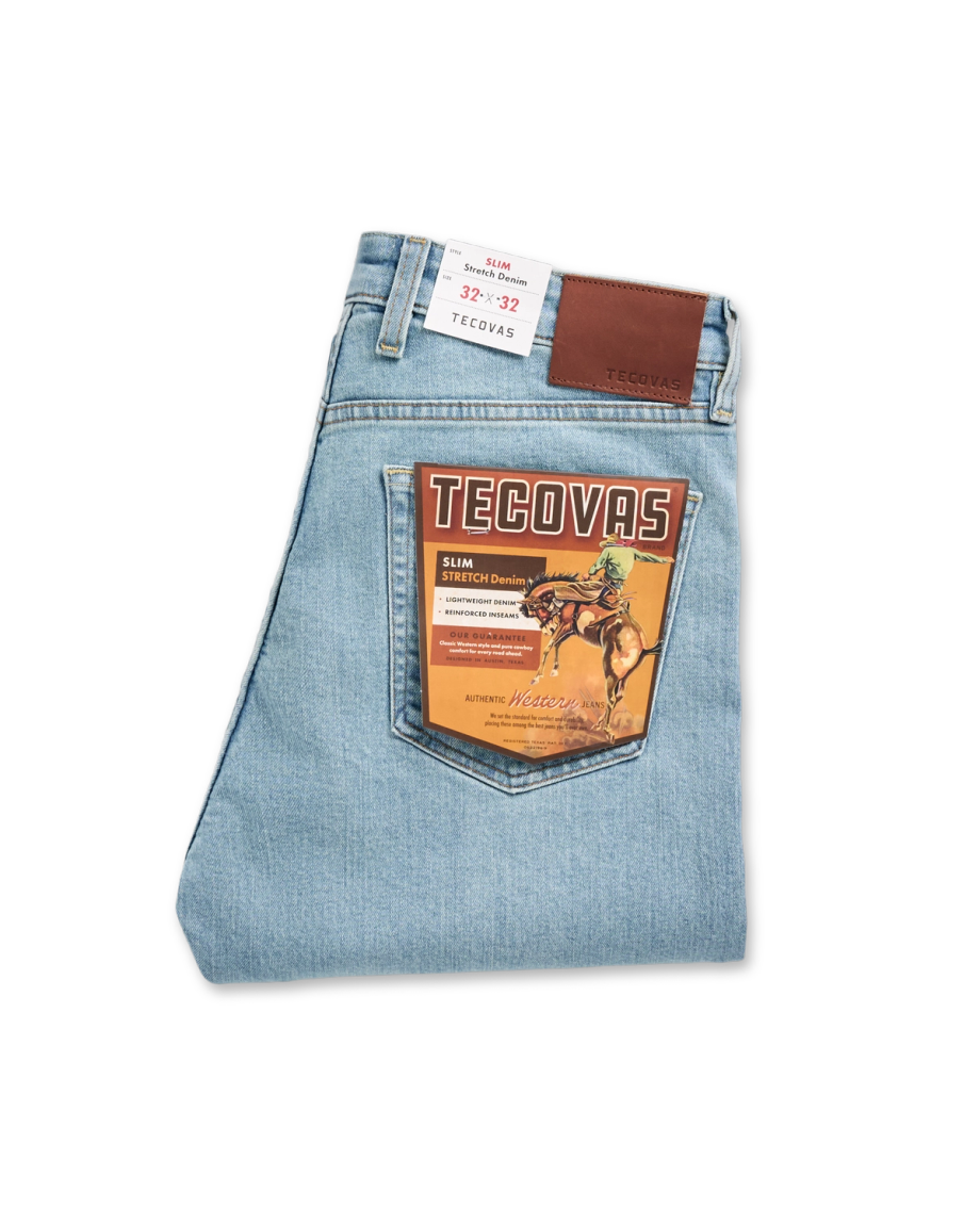 Folded view of Men's Slim Stretch Denim - Light Stone Wash on plain background