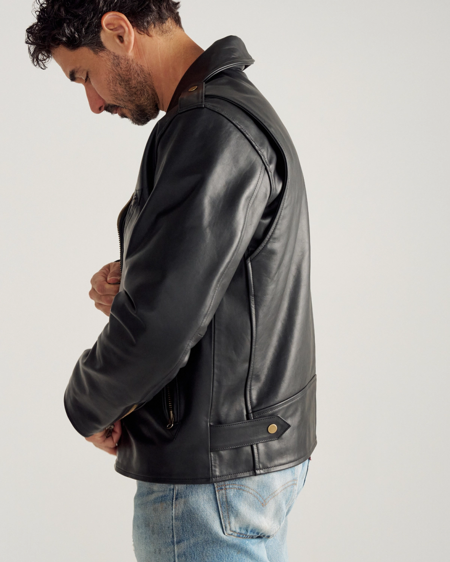 Front view of Men's Leather Biker Jacket - Black on model
