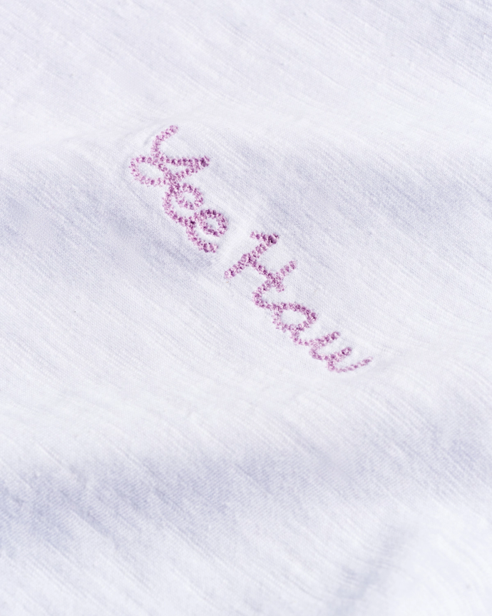 Closeup detail view of Women's Vintage Ringer Tee - White / Lilac