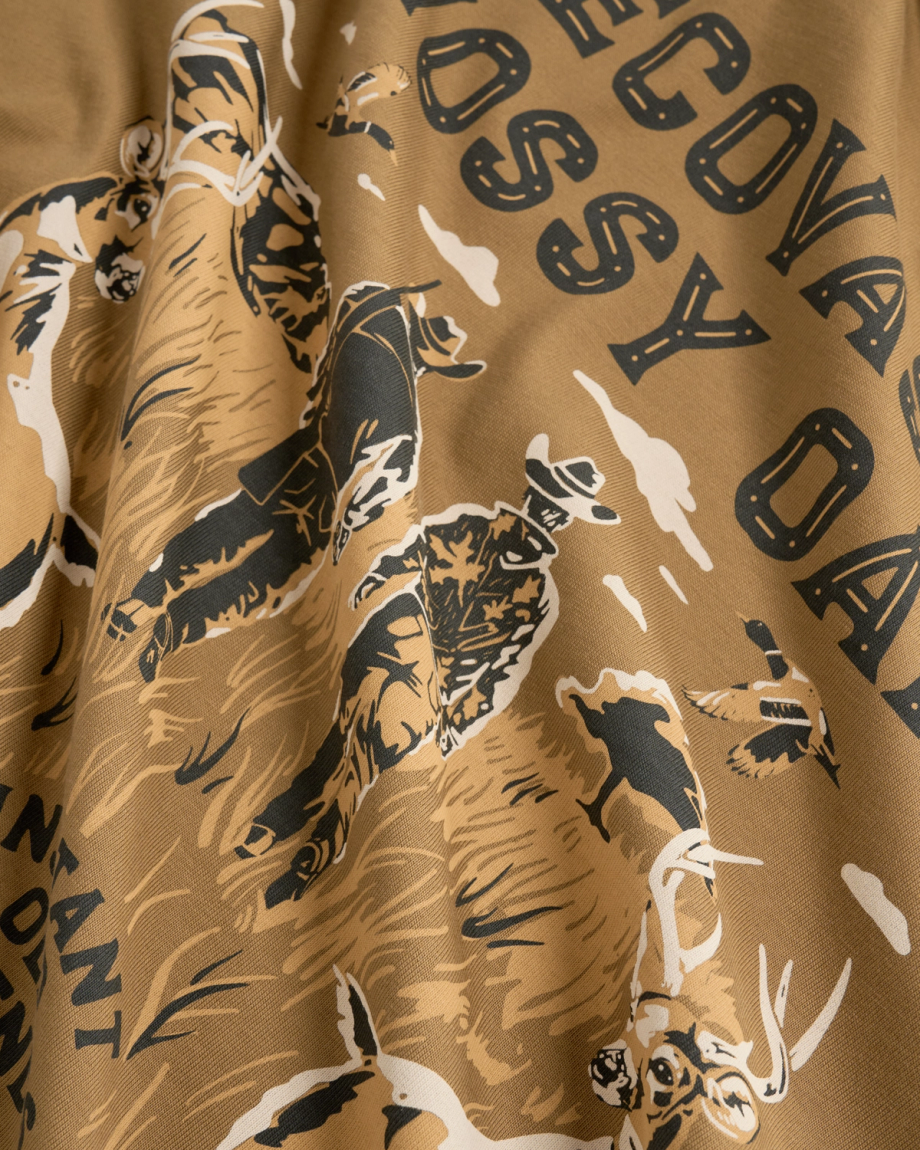 Closeup view of Men's Tecovas x Mossy Oak Cowboys & Deer T-Shirt - Olivewood