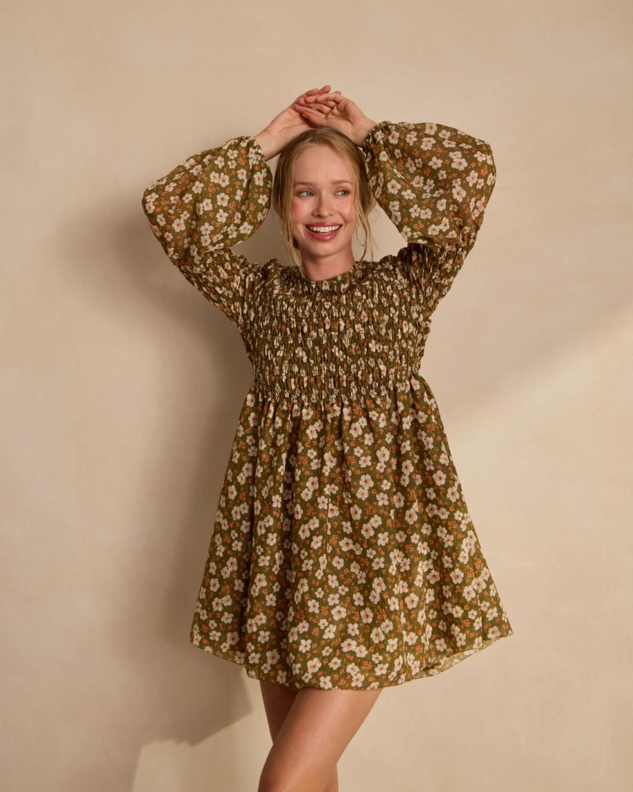 Front view of The Emma Dress by Kristopher Brock - Olive/Beige Floral Cotton Blend on plain background