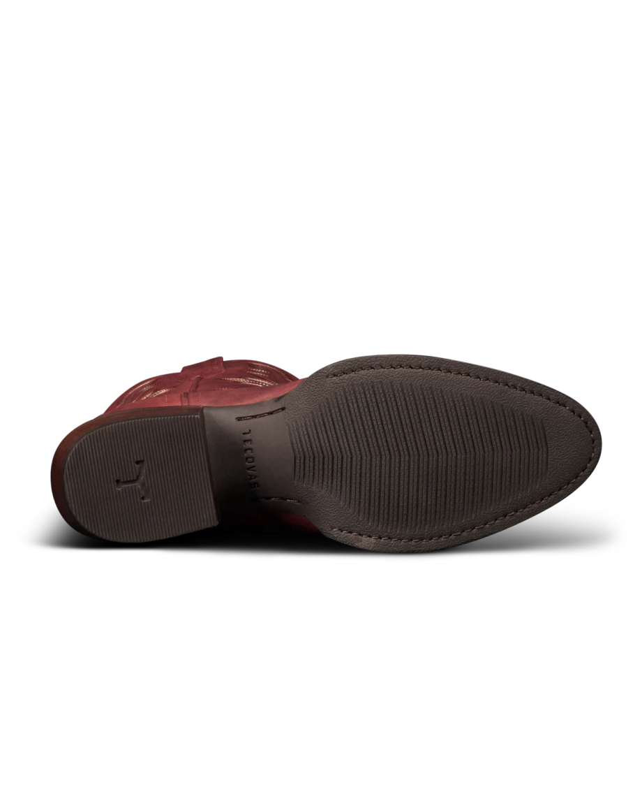 The Britt in Redwood Goat. The image shows the bottom view of a brown Redwood Goat dress shoe with a textured rubber sole and “FLORSHEIM” inscribed near the arch.