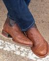 Man wearing the Wade Russet Brown Cowboy Boots