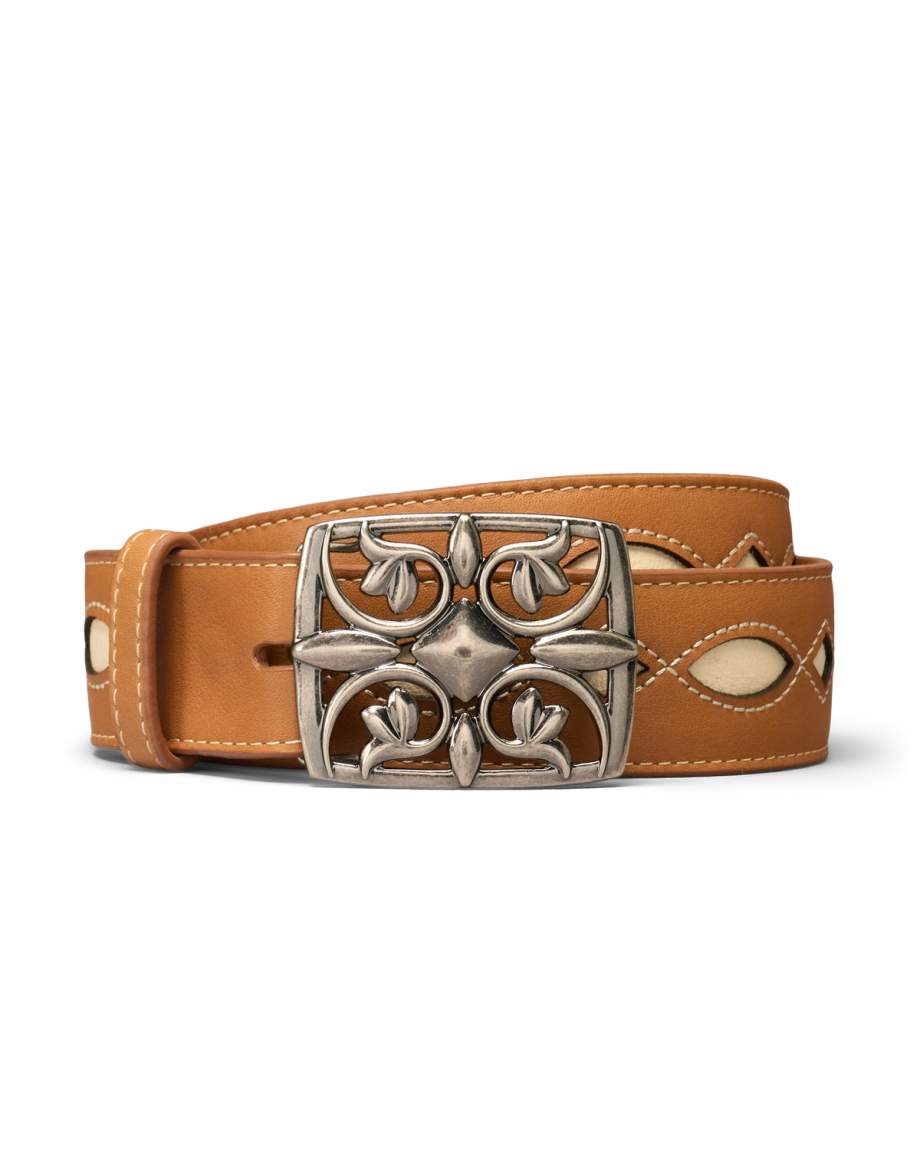 Tan leather belt with white stitching and cutout details, featuring an ornate silver buckle with a decorative pattern.