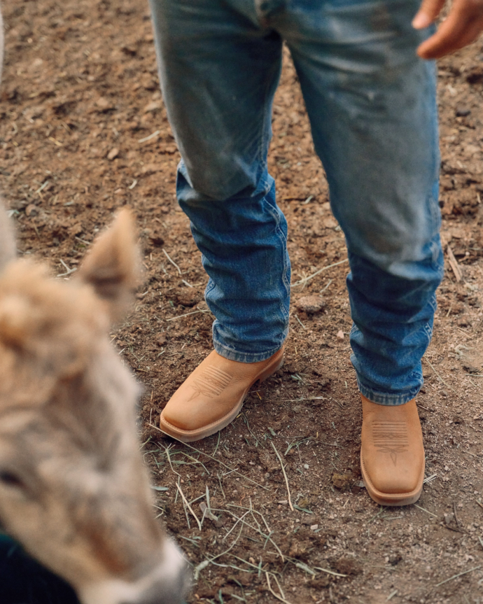 Toe view of The Rugged Square Toe - Saddle on plain background