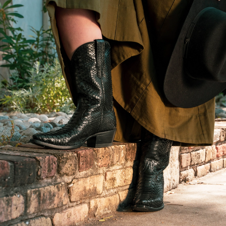 Cowboy boots 2025 and black jeans