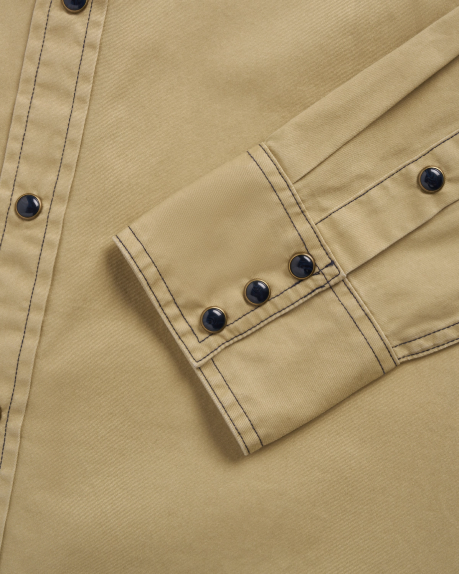 Closeup detail view of Men's Thorn Stopper Pearl Snap LS - Navy / Khaki