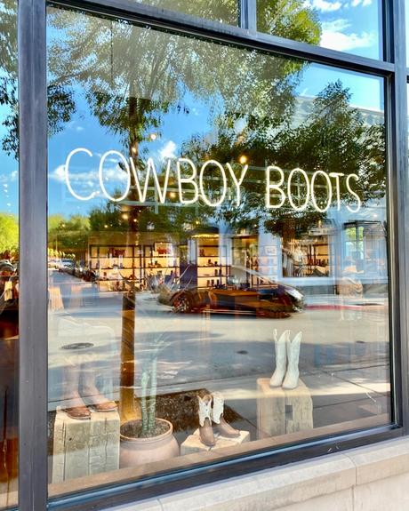 'Cowboy Boots' neon sign at the Tecovas store in Southlake Town Square