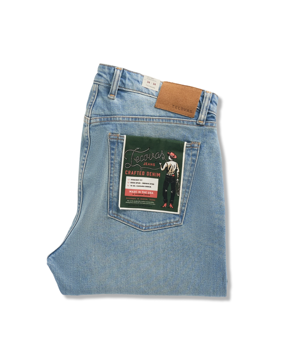 Folded view of Men's Straight Crafted Denim - Light Wash on plain background