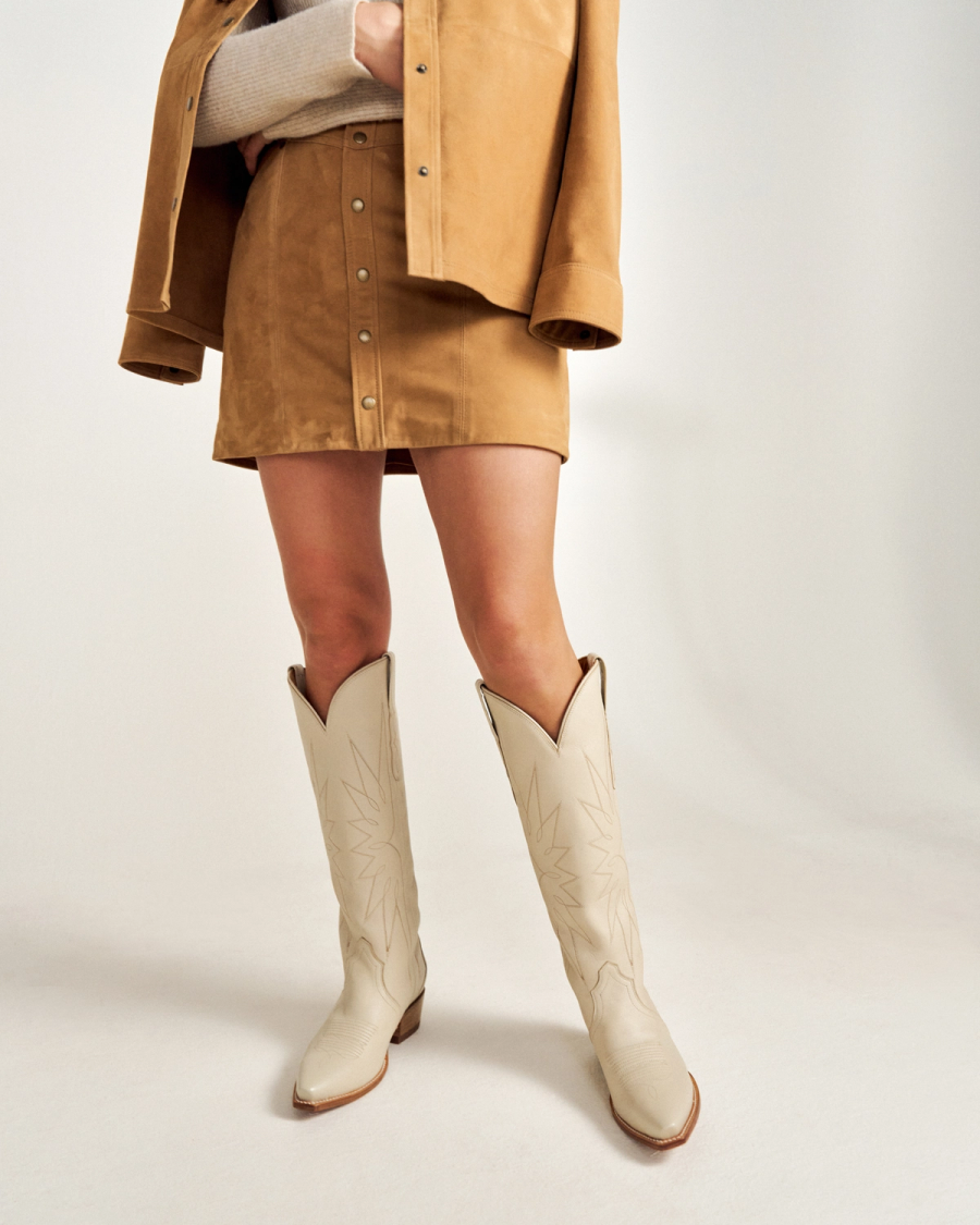 Front view of The Loretta - Cream on model
