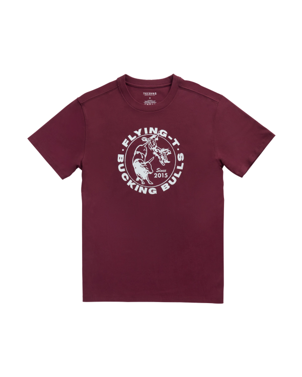 A maroon short-sleeve t-shirt with a white graphic of a bull and rider, and the text "FLYING-T BUCKING BULLS 2015" on the front.