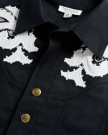 Closeup detail view of Women's L/S Applique Mini Dress - Black
