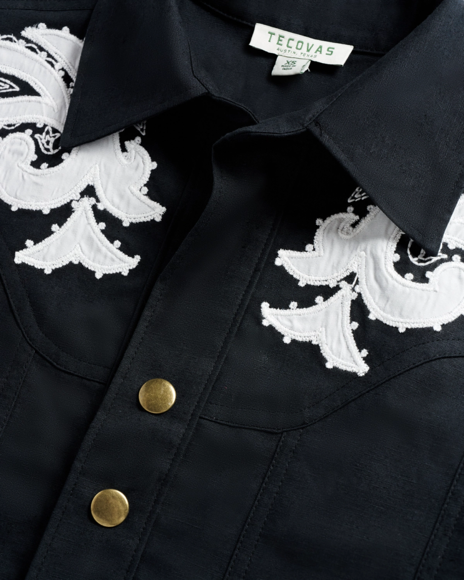 Closeup detail view of Women's L/S Applique Mini Dress - Black