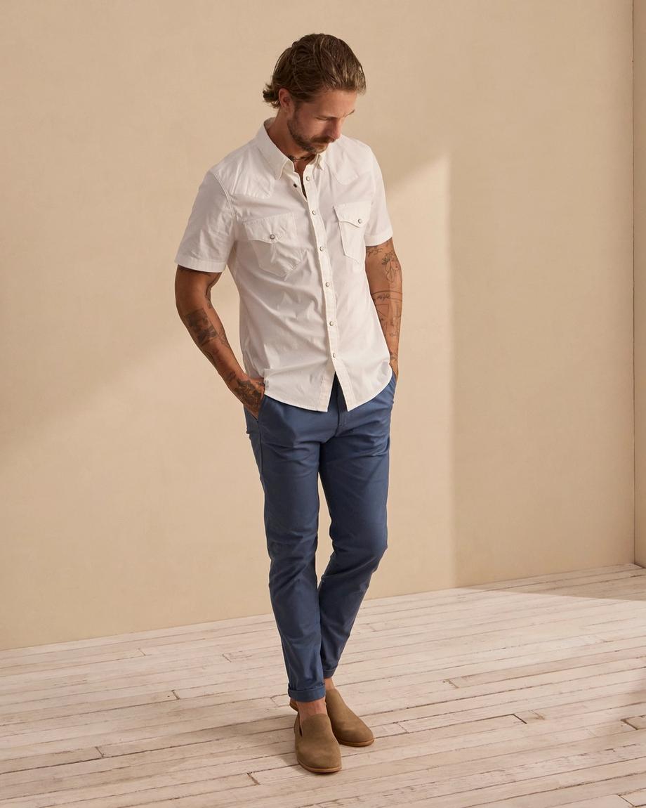 man wearing a granite grey suede slip on shoe