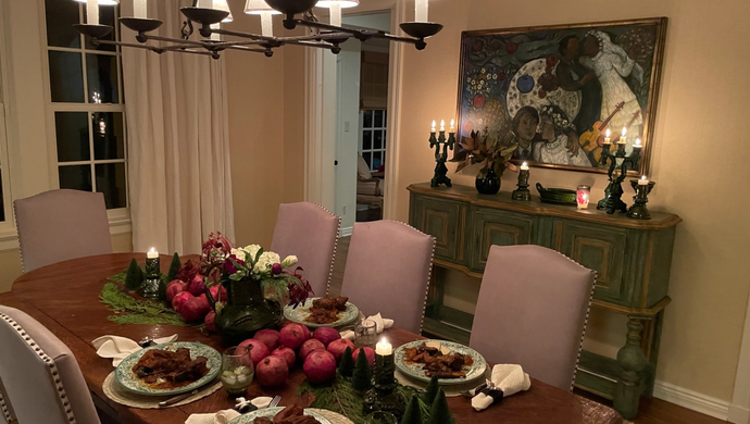 A view of a dining table with dessert on plates.