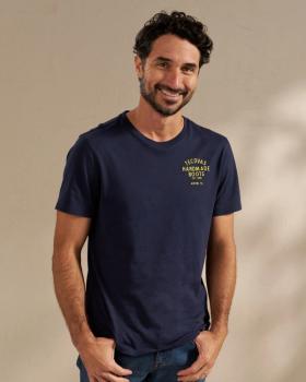 Man wearing a t shirt in a photo studio
