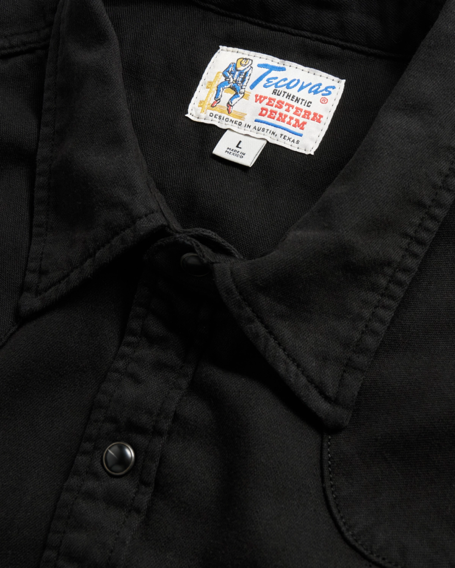 Closeup detail view of Men's Denim Long Sleeve Pearl Snap - Black