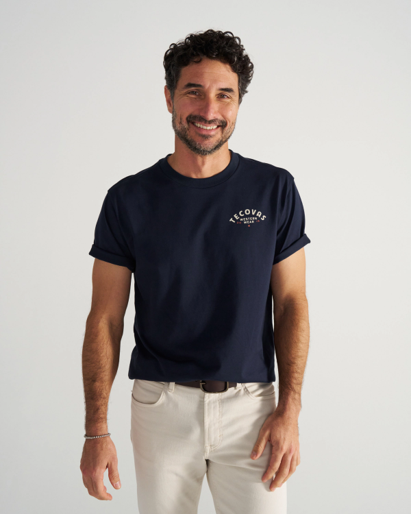 Front view of Men's Western Wear T-Shirt - Navy/Bone on model